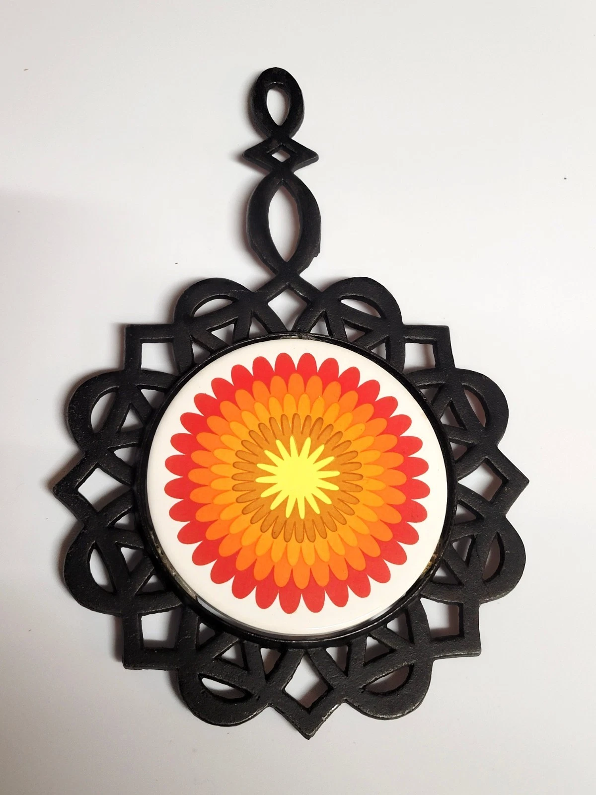 vintage 1970s psychedelic floral cast iron trivet and hot pad - product detail image 2