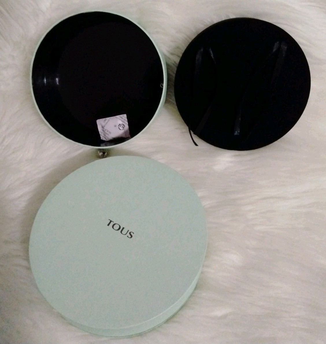 Joyero de cartón vacío verde plano TOUS XXL con campana elástica.