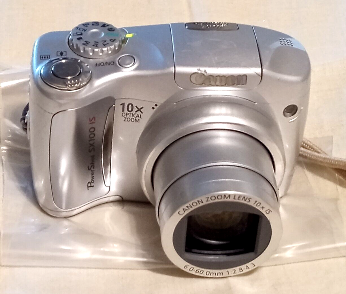 Canon Power Shot SX100IS 8MP Digital Camera silver w/battery & MC