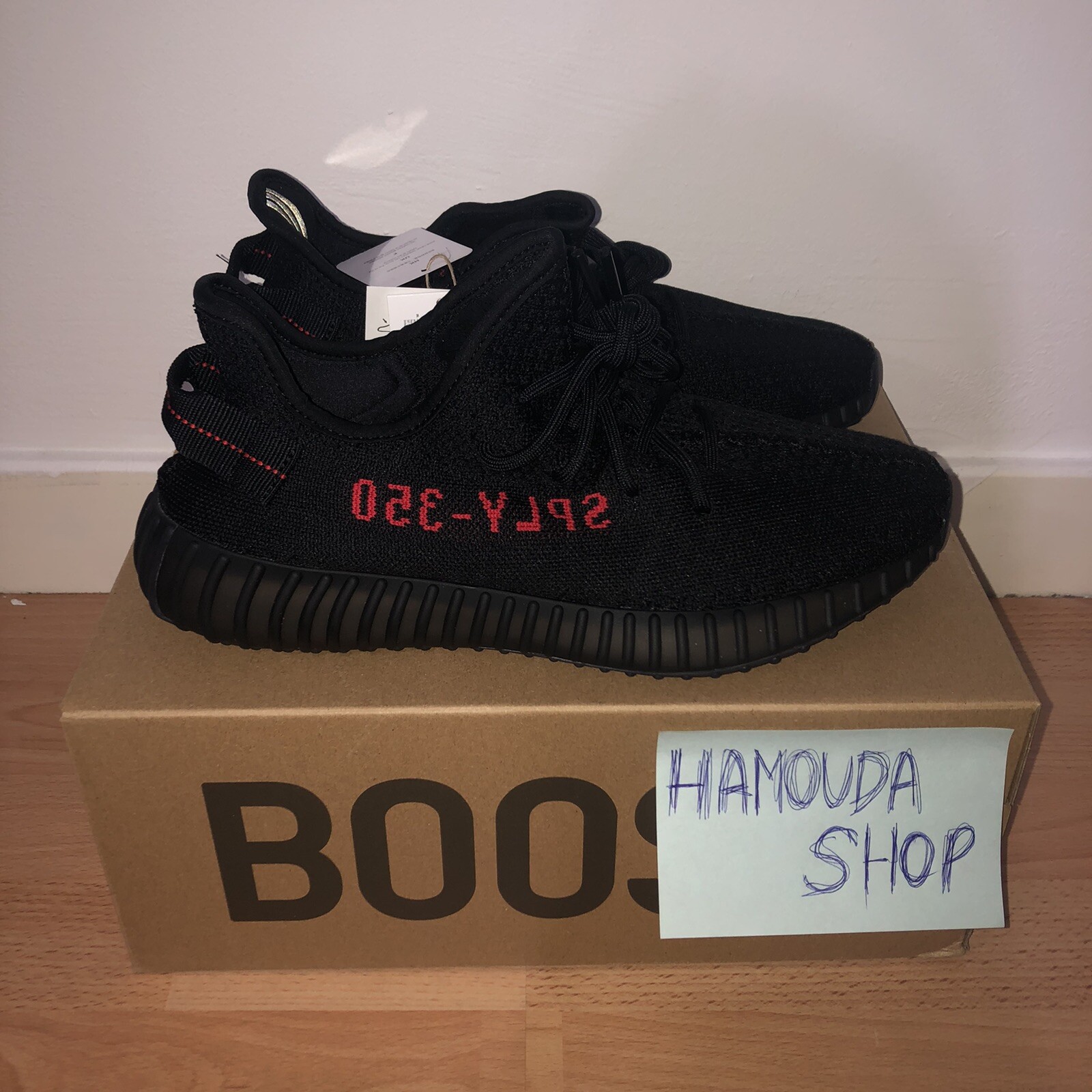 yeezy black and gold