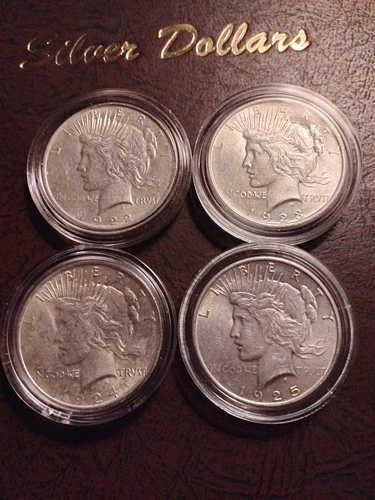 4/ BU? Peace dollars 1922,23,24,25 one money. All (p) mint. No reserve.