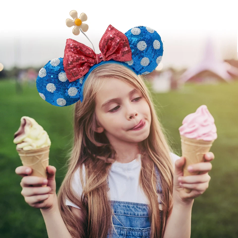 Diadema pequeña flor lentejuelas lazo orejas de Minnie azul lunares blancos parques Disney Foto 2 de 4