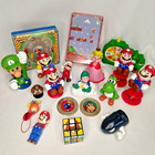 Nice Lot  NINTENDO Super Mario Bros Figures Toys Premiums 2x Rubik's Peach coins