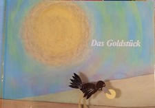 Das Goldstück signiert