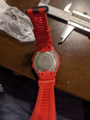 Invicta Activa X Red ACW513-004 digital watch water resistant light Box Manual - Picture 16 of 20