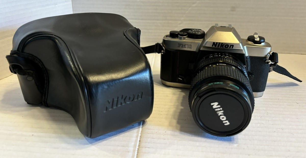 Nikon Camera FM10 35mm Film With 35-70 mm lens and Leather Nikon Camera FM10 35mm Film With 35-70 mm lens and Leather