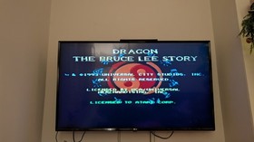 Boxed Atari Jaguar Console with 8 Games, spare controller and instructions.