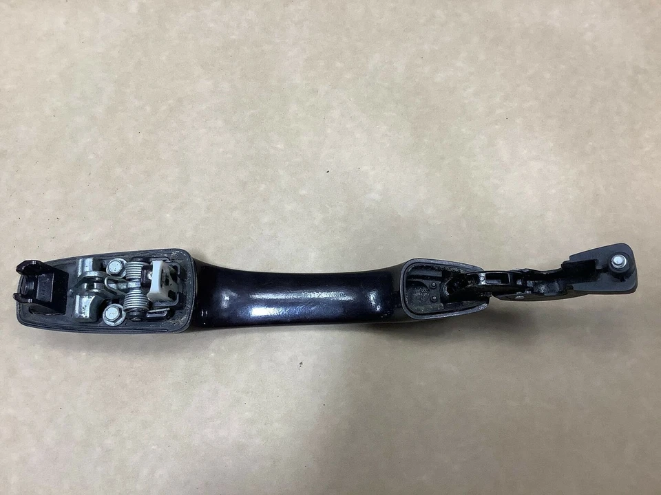 Volkswagen Routan 2010 pasajero trasero derecho manija de puerta exterior negro OEM+ Foto 3 de 4