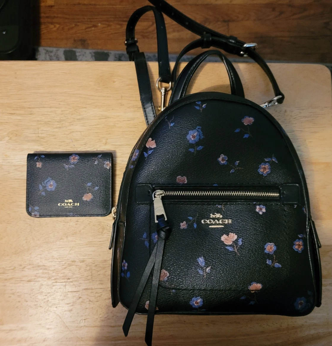 coach blue floral backpack Court with Lovely Butterfly Print, Midnight Navy Multi Fashion Signature coated canvas and smooth leather Inside zip cell phone and multifunction pockets Laptop compartment with zip closure Zip closure recycled polyester lining Top handle with 3 drop Outside zip pocket Luggage sleeve Adjustable shoulder straps Fits a 16 laptop 11 3/4 (L) x 16 1/2 (H) x 6 (W) Style No. Coach Men's Hudson Backpack In