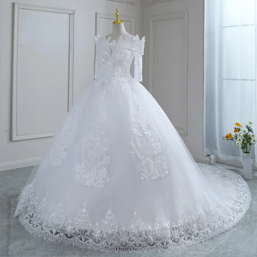 Nueva Llegada Blanco Vestidos de Novia Fuera del Hombro Media Mangas Encaje Bordado Vestido Foto 2 de 4