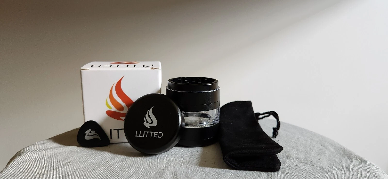 Premium Matte Black herb and Spice grinder. See Through Chamber LLITTED