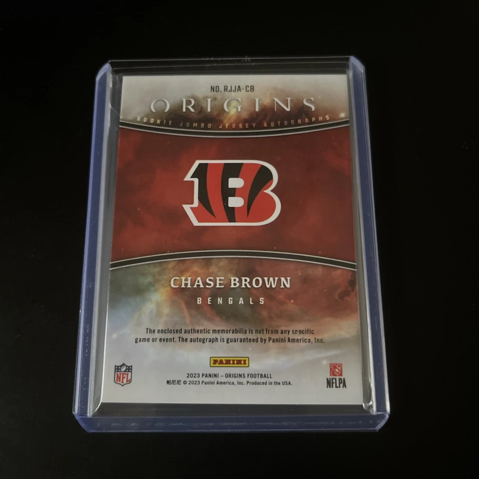 2023 Panini Origins - RookieJersey Autographs #RJJA-CB Chase Brown (AU, MEM, RC) - Image 2 of 2