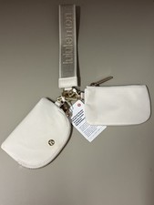 Authentic Lululemon Dual Pouch Wristlet Metallic Wordmark Light Ivory NWT
