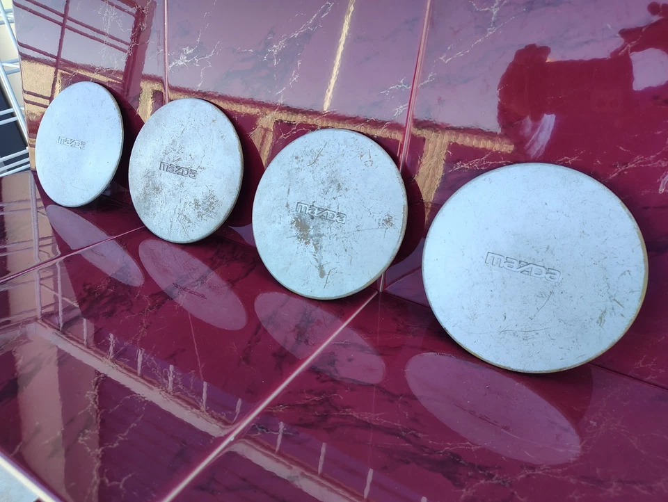 1990 - 1995 年马自达 323 Protege 626 车轮中心盖套装 (4) 原始设备制造商 # B457-7502 — 第 4/4 张图片