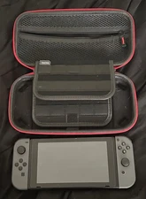 Gray Nintendo Switch - 256 GB - Pre-Owned - Comes w/ Case & games