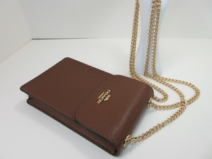 coach north south phone crossbody