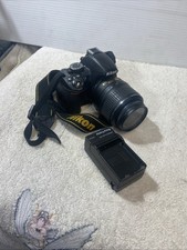 Nikon D3100 14.2MP Digital SLR Camera with 18-55mm lens Charger, Battery 32GB SD