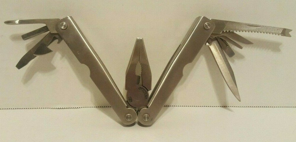 **Multi Tool with Driver and Extra Bits within the Case**