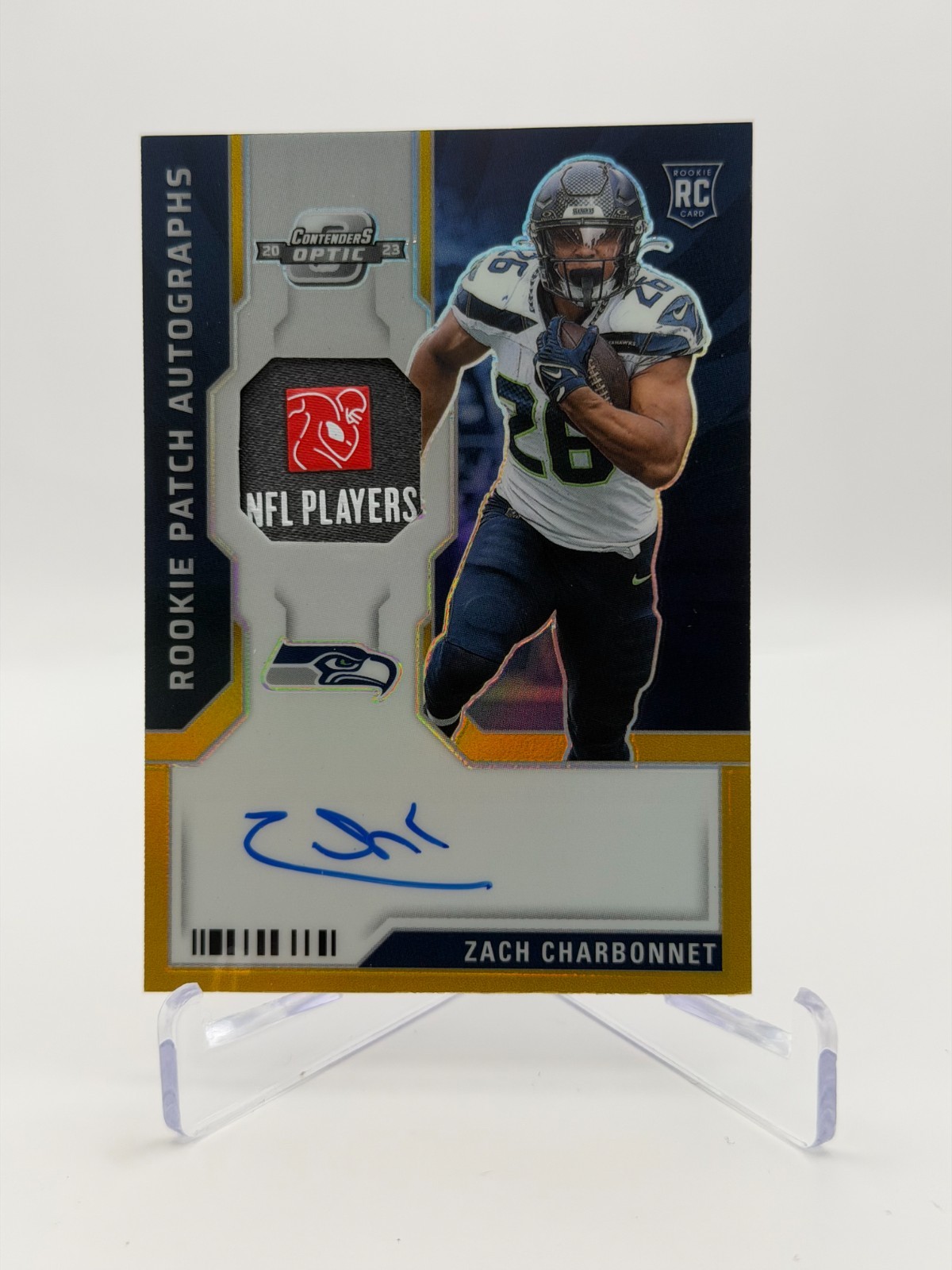 2023 Contenders Optic Zach Charbonnet RPA NFL Laundry Tag Gold Prizm /5 Seahawks