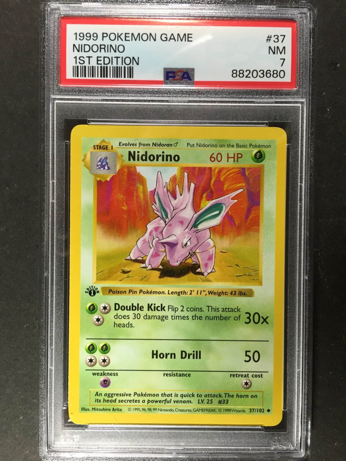 1999 Pokemon Game Base Set 1st Edition #37 NIDORINO PSA 7 Shadowless