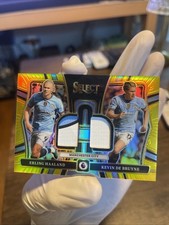 2024-25 Panini Select EPL Dual Swatches Erling Haaland/Kevin De Bruyne Gold /10