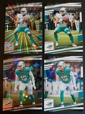 (4) 2022 Panini Prestige Astral/Sunburst/Base Tua Tagovailoa # 180,185 Dolphins