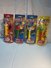 Lot of four mixed Pez Dispensers in the original packaging, see description