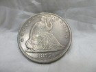 1877 Seated Half Dollar VF-EF — photo 1