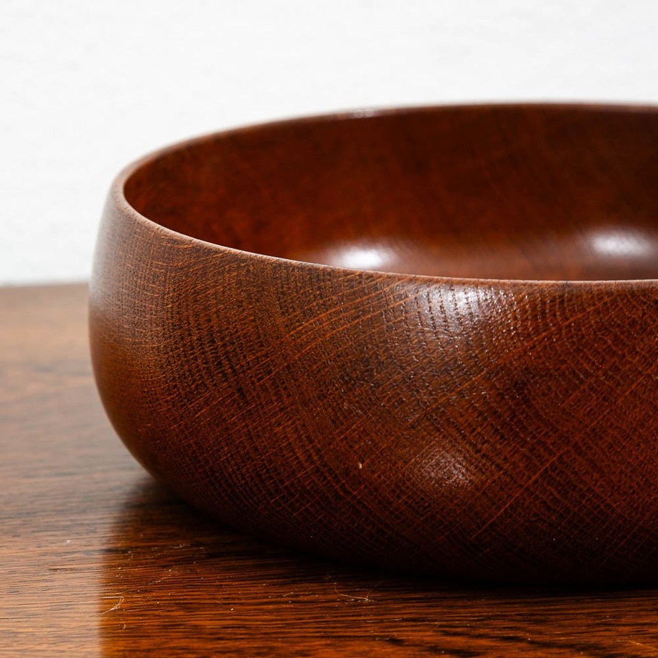 Staved teak construction — individual strips of wood coopered together like a barrel — is a lost craft technique that makes this bowl genuinely special.