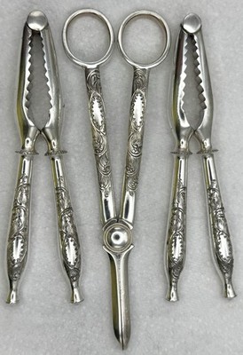 Antikes sehr verziertes Nussknacker Set versilbert