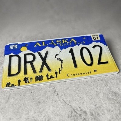 Alaska Gold Rush Centennial License Plate DRX 102 Blue Yellow Black
