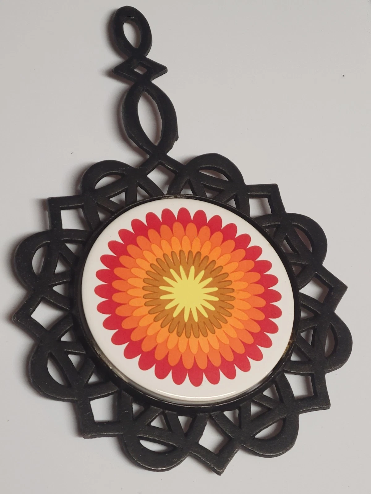 vintage 1970s psychedelic floral cast iron trivet and hot pad - product detail image 4