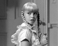 Patty Mccormack As The Evil Rhoda Holding Matches The Bad Seed 8x10 Picture Cele