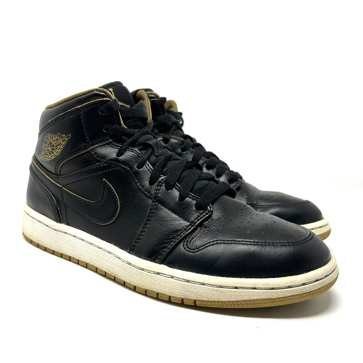 Jordan shoes hotsell black and gold