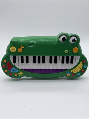 Baby Genius Crocodile Keyboard Flute Whistle DJ Guitar Saxophone