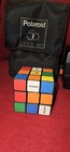 Polaroid One Step 600 & 50th Anerversary Case And Polaroid Promo Rubiks Cube — photo 9