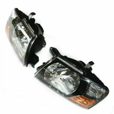 Headlights Head Lights Lamps 2000-2006 For Mitsubishi Pajero Montero L + R Set