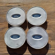 Ford Freestar center cap set of 4, 2004-2007 part number 3F23 1A096 BB S4