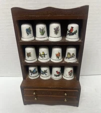 Small Wooden Hutch with 12 Collectible Porcelain Thimbles Display