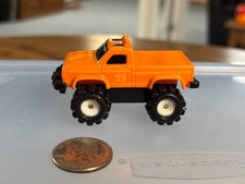 Schaper Stomper Orange Ford 4x4 Pickup