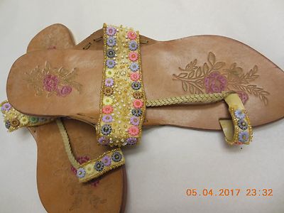 Beautiful hand work beige leather sandals by'' Naughty N..key'' size  9 1/2