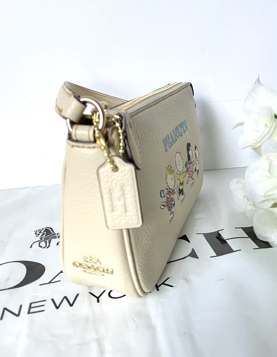 国内即送COACH X PEANUTS スヌーピー ノリータ 19 ポーチ CE858 国内即送COACH X PEANUTS スヌーピー ノリータ 19 ポーチ CE858