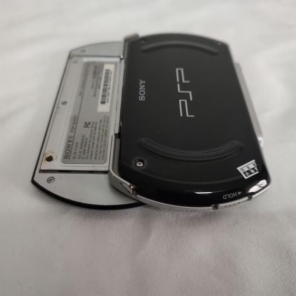 Sony PSP GO console Black with Charger PSPN1001 Music button