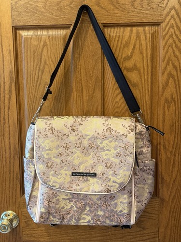 Petunia Pickle Bottom satin jacquard diaper bag featuring ornate floral dragon