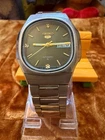 Vintage Seiko5 Automatic man's watch With cushion shaped case emerald green dial