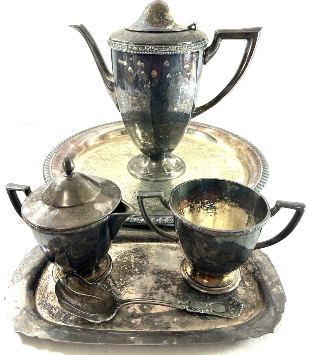 A Wm. Rogers Antique US Silver-Plated Teapots, Coffee Pots & Sets