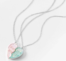 Claire  s Best Friends Pink  Blue UV Color Changing Heart Pendant Necklace.