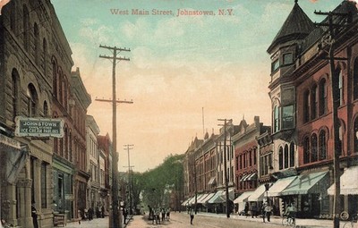 *Postcard ~ Johnstown New York, West Main St., Ice Cream Parlor in Foreground