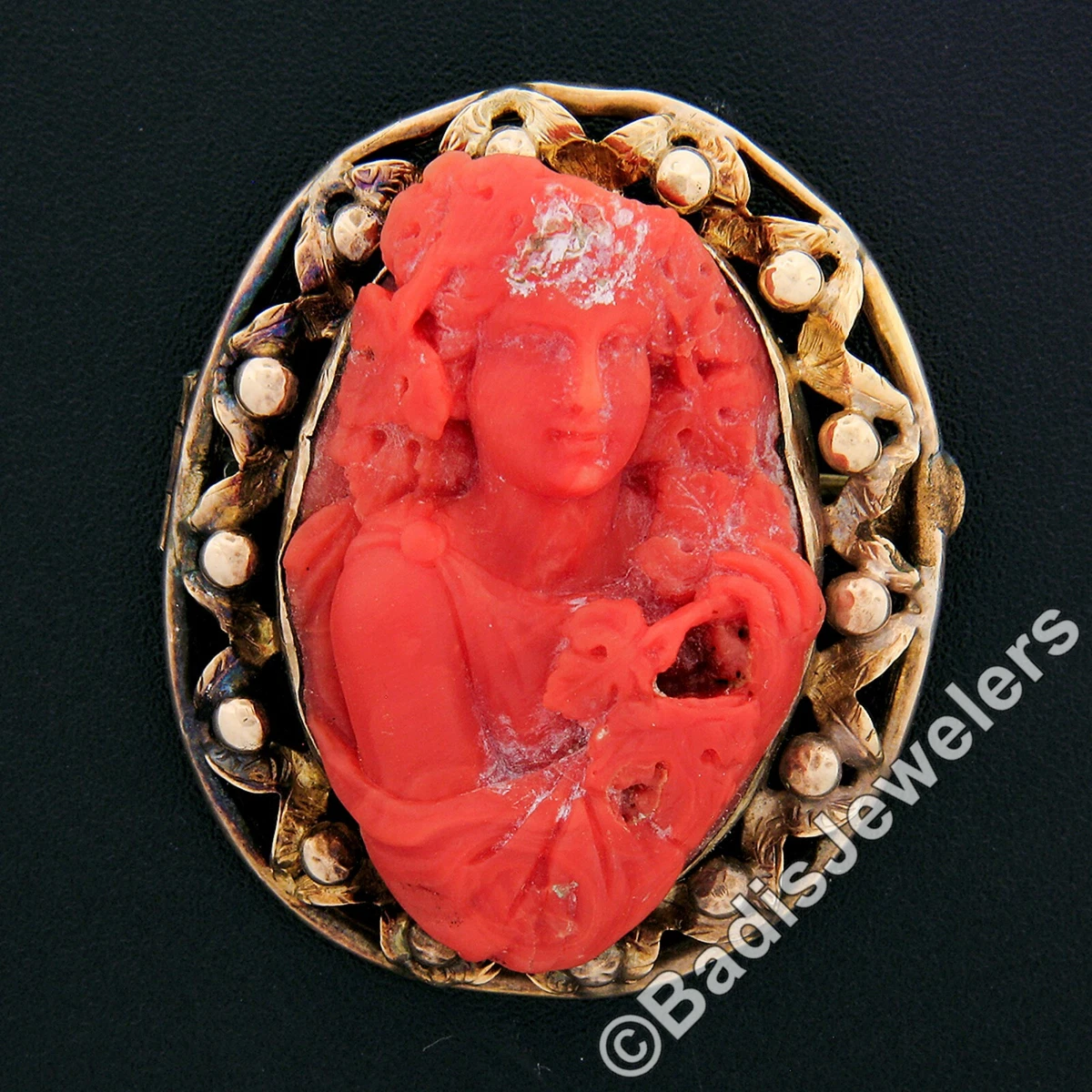 Antique coral shop brooch