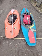 White Water Kayaks. (2). Canoes.